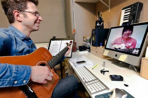 Edinburgh Guitar Lessons – Fun, Professional Tuition for All Ages | Morningside School of Music Edinburgh guitar lessons tutor, Brian from Morningside, offering guitar tuition online to one of his pupils.